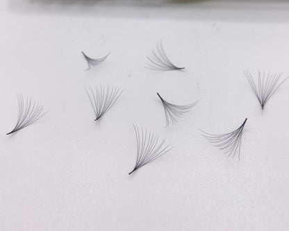 Eyelash extensions premade volume fans 12D with a package labeled 'Pinneacle' on a white background